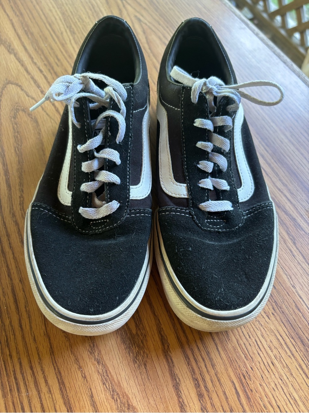 Van’s women’s Black and White Sneakers.